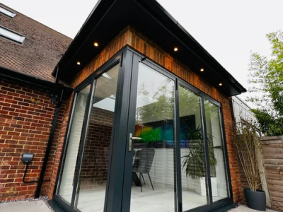Finished extension to the house - addition with large corner door