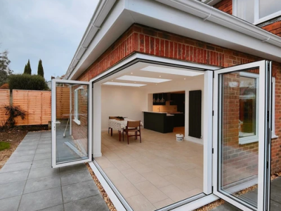 Finished extension to the house - addition with large corner door