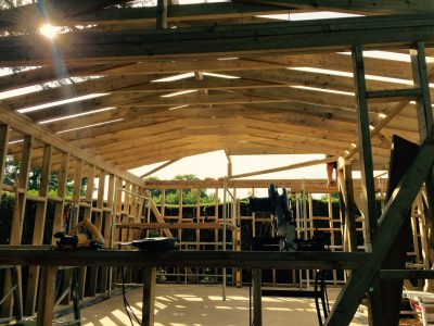Timber frame with roof under construction